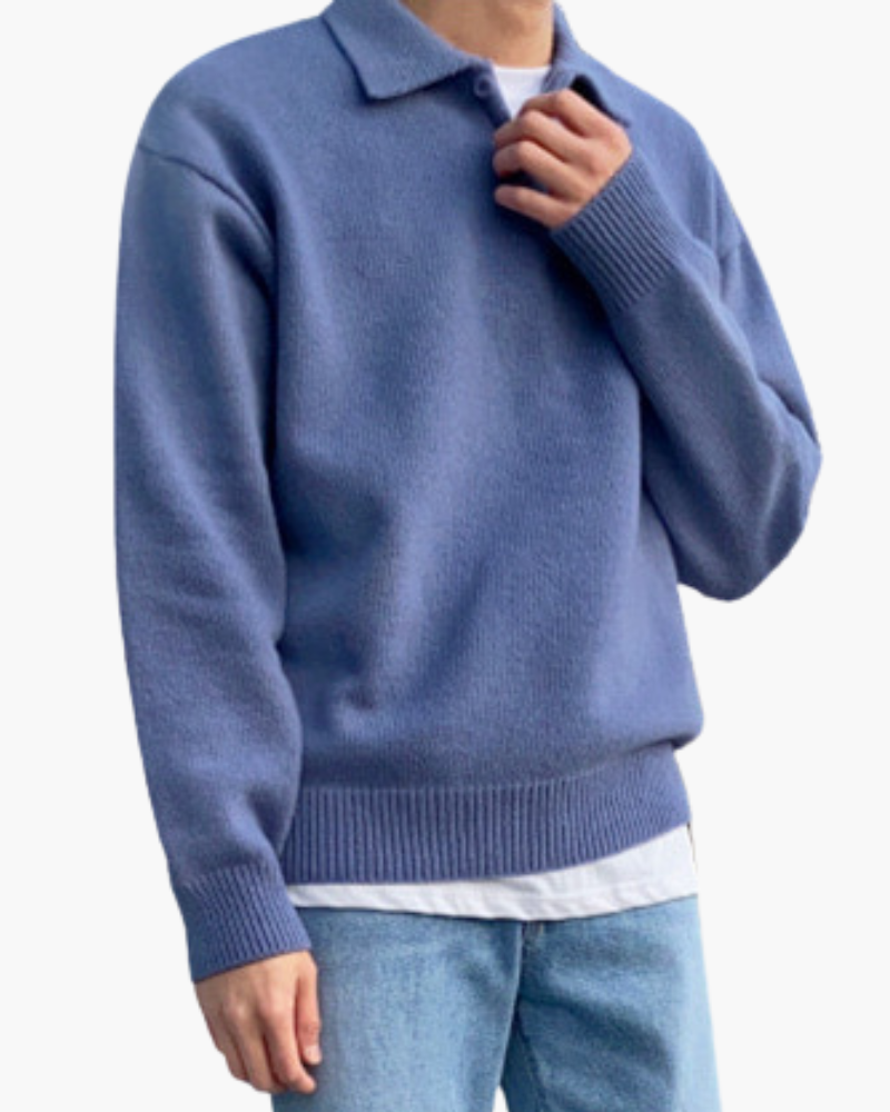 Wool sweater with buttons and half-zip closure.
